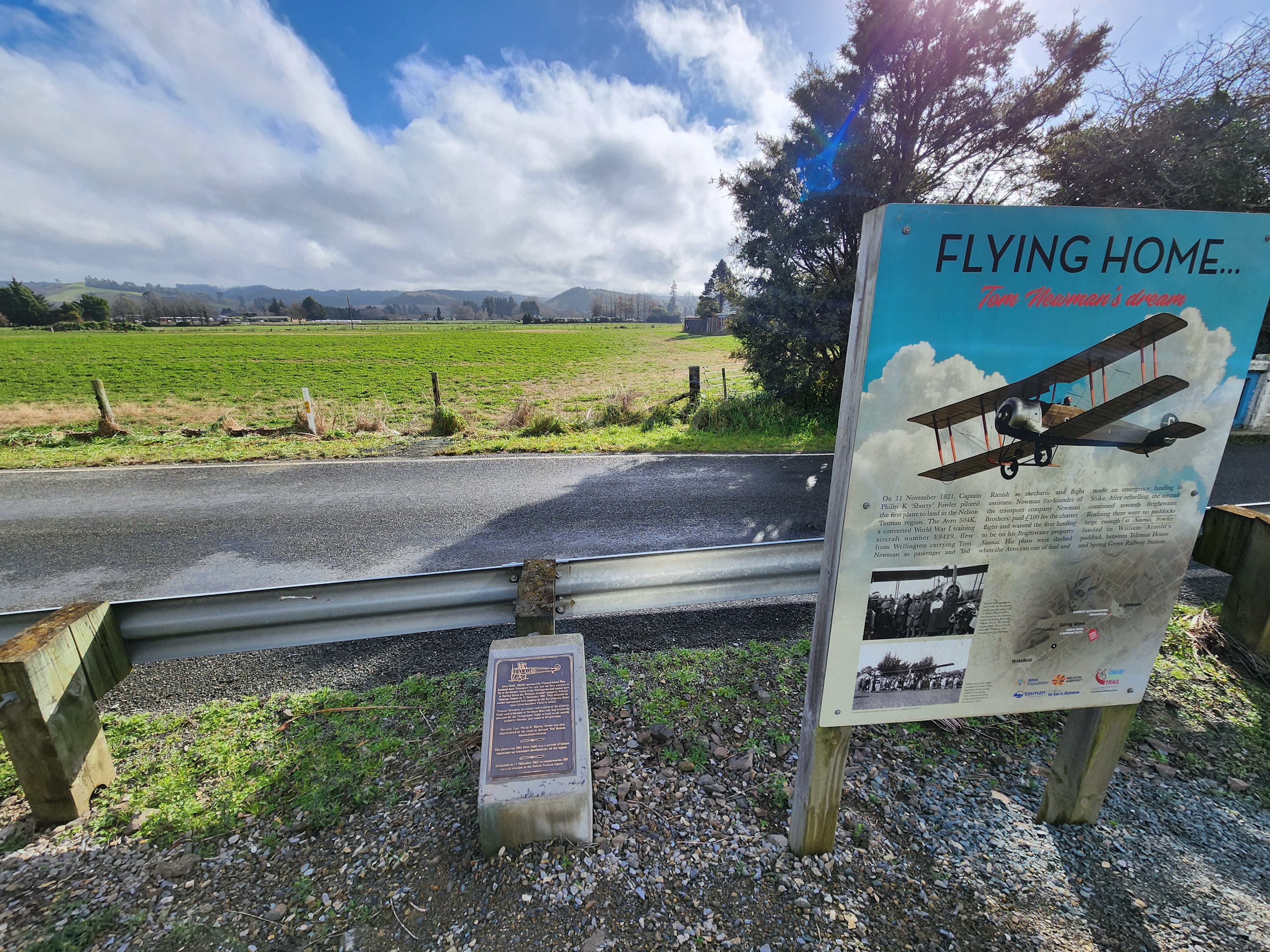 Photo of the current information panel and the field the plane landed in.